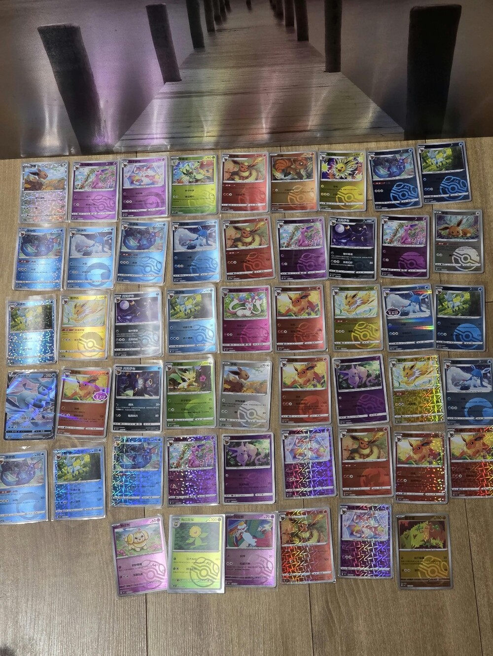 Pokémon TCG Bulk Holo & Rare Card Lot - Assorted Colors Eevee